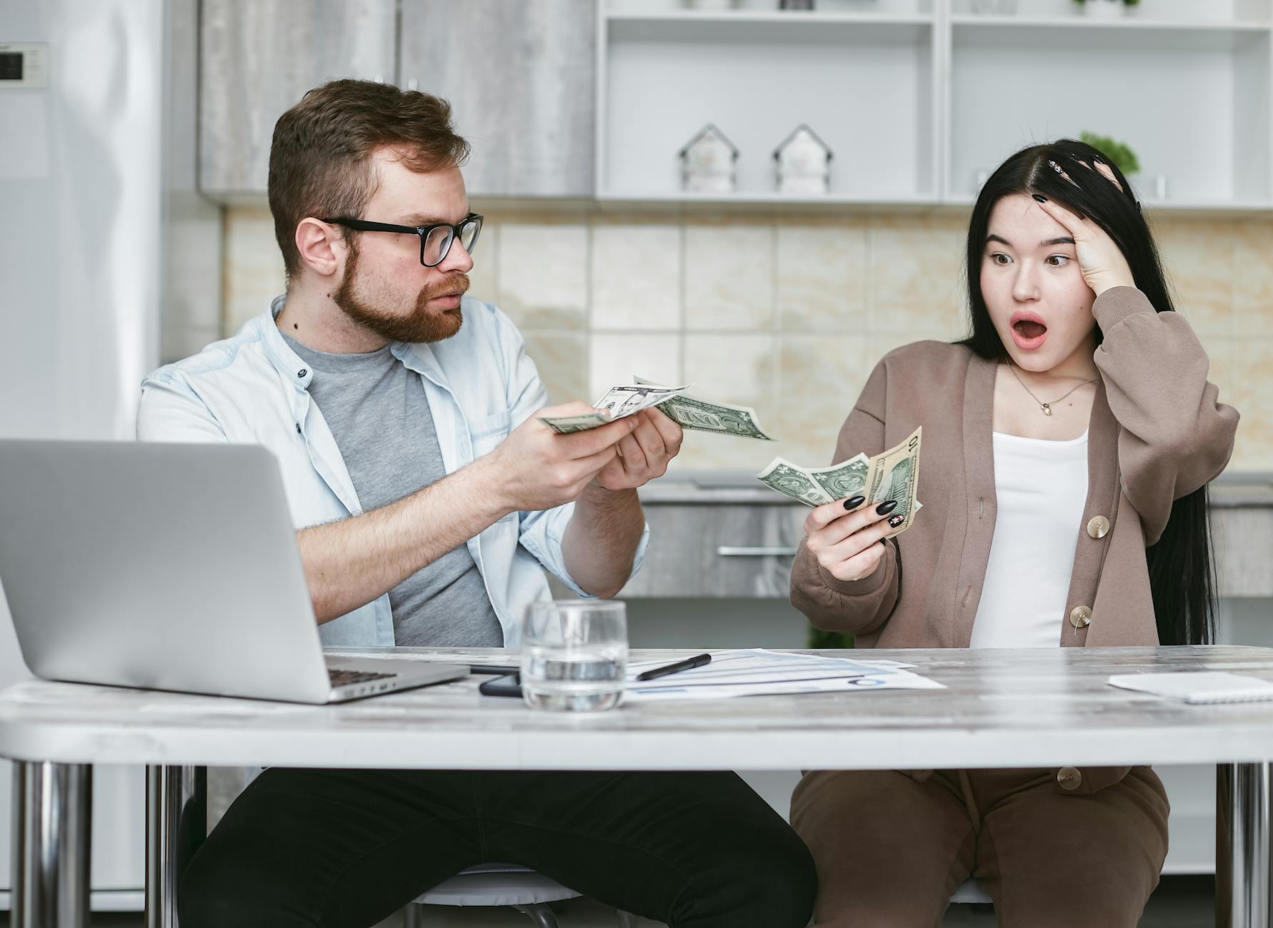 Couple discussing finances together representing Christian marriage and money management