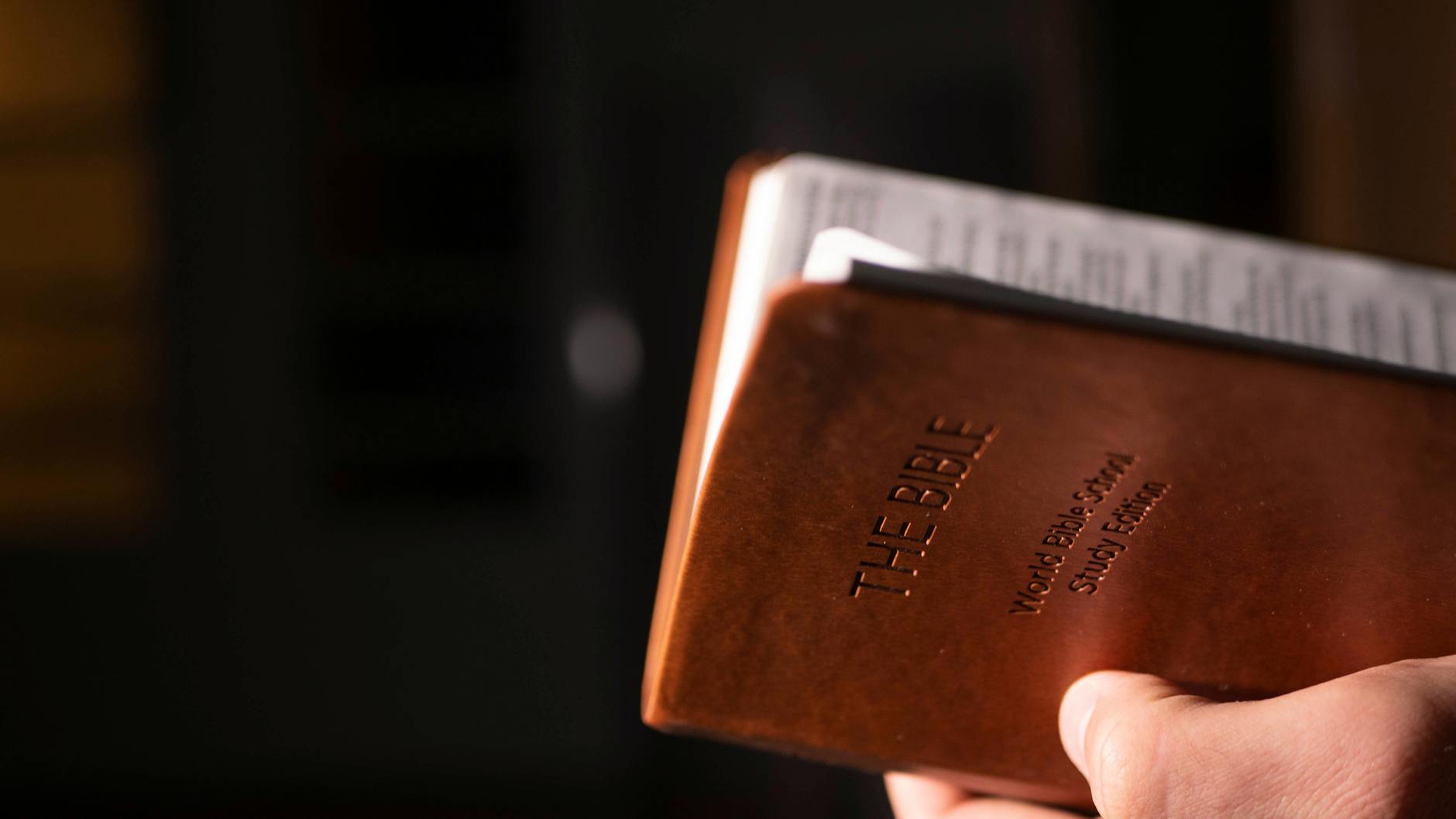 Open Bible with financial planning materials representing Christian personal finance stewardship