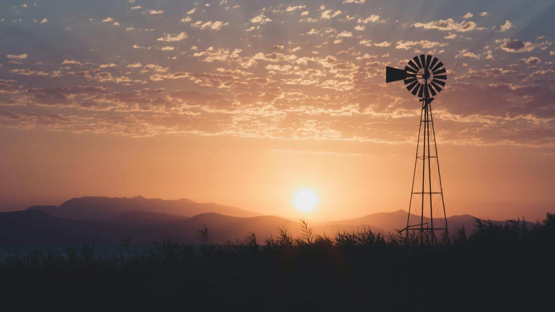 A sunrise over landscape representing the bright future of faith-based investing